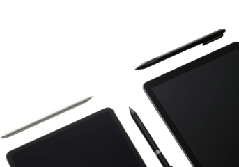 Two Digital Tablets and Stylus Pens on a Modern Workspace with Black and White Colors