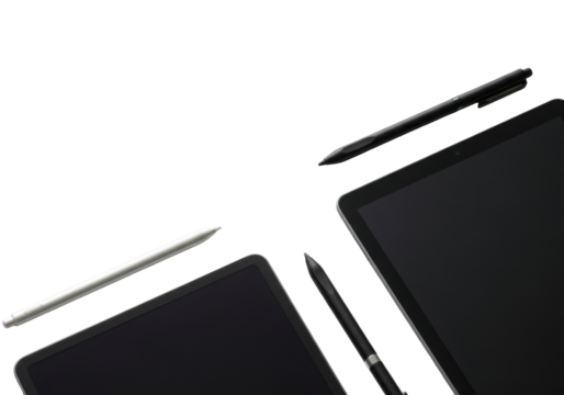 Two Digital Tablets and Stylus Pens on a Modern Workspace with Black and White Colors