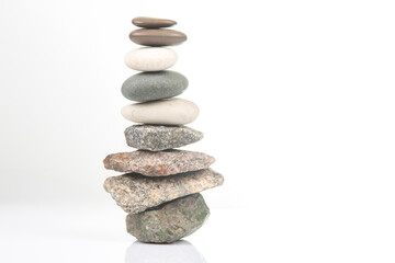 Balanced stack of stones showing harmony and tranquility in a minimalist setting