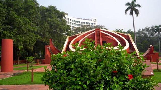 Historic Jantar Mantar observatory in Delhi cityscape