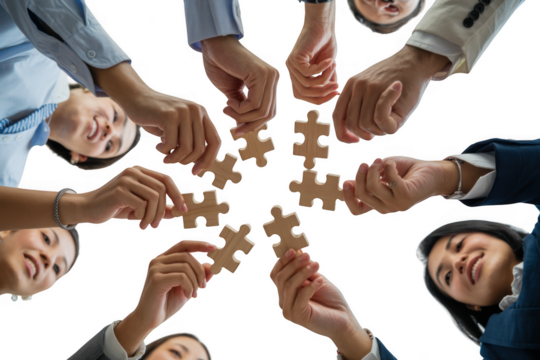 Diverse hands collaborating building a puzzle together in a symbol of teamwork and unity transparent background
