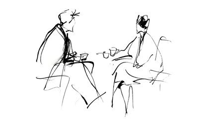 Two people are sitting at a table, one of them is holding a cup