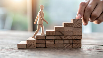 Inspirational coaching image showcasing giving personal growth concept. A wooden figure climbs blocks, symbolizing progress and achievement.