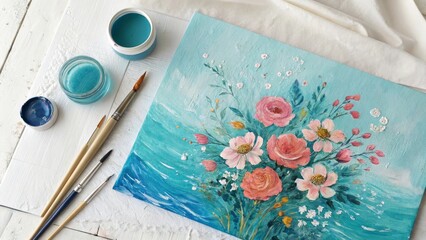 Artist s workspace with floral painting and art supplies