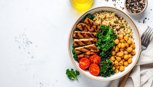 Buddha Bowl with Grilled Tempeh, Quinoa, Chickpeas, and Kale, Plant-Based Power Bowl with Grilled Tempeh and Fresh Vegetables for a Healthy Lifestyle