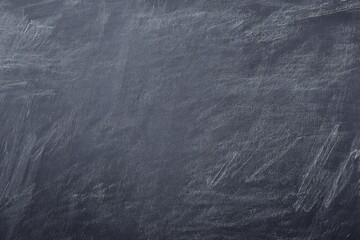 Dark gray textured background with white scratch marks