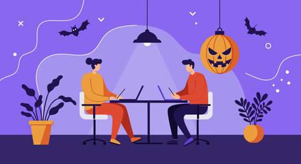 Two colleagues work diligently on laptops in a festive office adorned with Halloween decorations like a jack-o'-lantern and bats. Ideal for seasonal business themes.