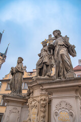 statues on the Charles Bridge, evening Prague. Czech Republic