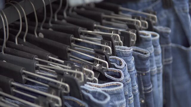 Closeup view of row of jeans at a mass market store