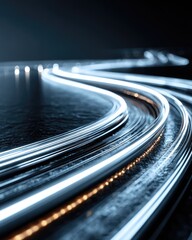 Abstract, curving, metallic lines of light,  a dark, textured surface