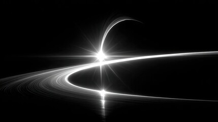 Abstract light trails curving in a circular pattern on black background