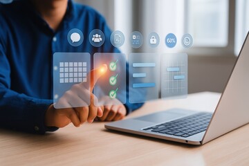 A person interacts with a holographic interface displaying productivity and task management tools on a laptop.