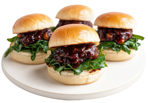 Juicy sliders with barbecue sauce and fresh greens on white plate