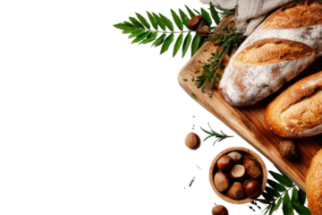 Freshly baked baguettes on a wooden board with nuts and herbs