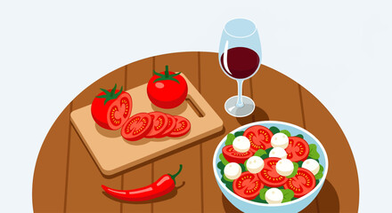A delightful meal awaits! Freshly sliced tomatoes, a vibrant caprese salad with mozzarella, a spicy red chili, and a glass of red wine, all artfully arranged on a wooden table.