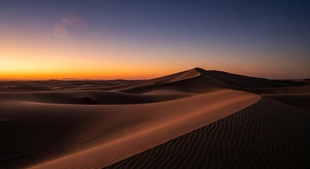 Spectacular desert landscape at twilight featuring layered sand dunes
