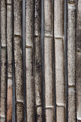 Unclean bamboo fence with mold
