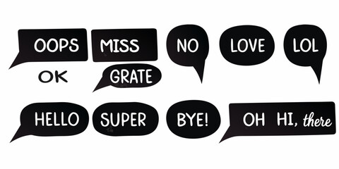 Collection of black speech bubbles with popular phrases and words in white text on a white background