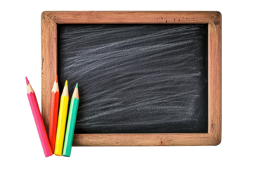 Blackboard with colorful pencils ready for creative learning in an educational environment