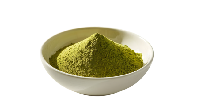 Vibrant green matcha powder rests pristine white bowl, offering delightful and aromatic ingredient for healthful drinks and culinary