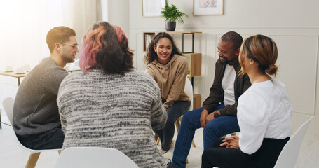 Support, group counseling and happy people in circle for addiction recovery. Psychology, men and women together for therapy session, help or talking for alcoholic rehabilitation in community center