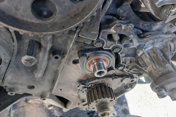 Close-up of a newly installed seal on an intermediate shaft in a diesel engine, ensuring proper...