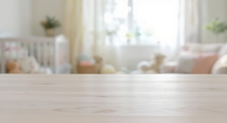 Empty light wooden table top with a soft focus baby nursery room in the background