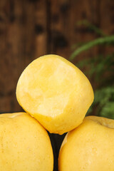 Fresh Yantai Fuji Apples with Creamy Flesh on Rustic Wood Background - Premium Fruit Photography