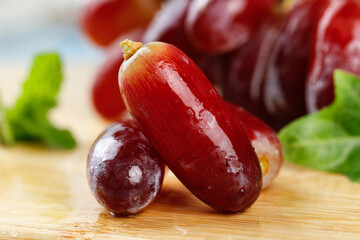 Fresh Red Finger Grapes on Wooden Board - Organic Fruit Photography