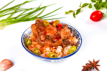 Spicy Braised Oxtail Stew with Rice in Traditional Blue Bowl - Hearty Beef Tail Bone Dish