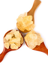 Raw Yellow Rock Sugar Crystals in Wooden Spoons Natural Cane Sugar Sweetener Ingredient