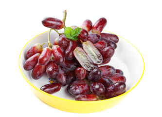 Fresh Red Finger Grapes from Yunnan in Bowl with Mint Leaf