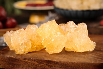 Large Yellow Rock Sugar Cubes Handmade Crystalline Sweetener on Wood Board