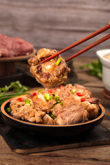 Spicy Stewed Beef Tail with Vegetables in Bowl Asian Cuisine Chopsticks