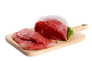 Fresh Raw Beef Tenderloin with Sliced Steaks on Wooden Cutting Board White Background