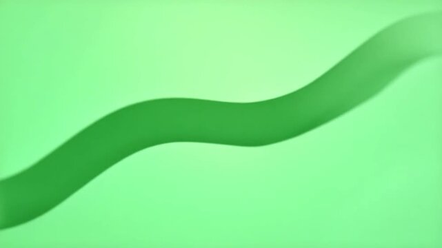 A Calming Green Background that Features Minimalistic Design Elements for Various Uses