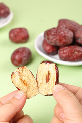 Ruoqiang Red Jujube Dates from Xinjiang Split Open Showing Natural Dried Fruit Interior