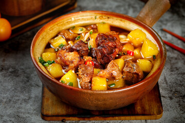 Braised Beef Stew with Yellow Potatoes in Clay Pot - Traditional Comfort Food Dish