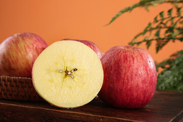 Fresh Red Striped Apples from Shandong China Showing Cross Section and Natural Beauty