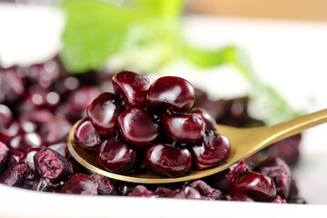 Purple Glutinous Corn from Xishuangbanna Yunnan China on Golden Spoon Traditional Asian Food Ingredient