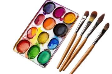 Watercolor palette with vibrant paints and a selection of brushes arranged on a clean surface ready for artistic creation and exploration of color