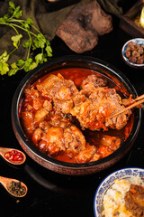 Spicy Oxtail Beef Stew in Clay Pot with Rice - Traditional Comfort Food Perfection