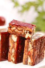 Delicious Xinjiang Date Walnut Bars - Traditional Chinese Sweet Confection with Fresh Red Dates and Nuts