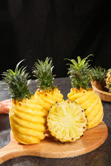 Fresh Xuwen Pineapples with Torn Flesh on Wooden Board - Zhanjiang Tropical Fruit