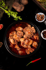 Spicy Stewed Oxtail with Fresh Herbs and Yellow Spices in Rich Red Broth Traditional Comfort Food