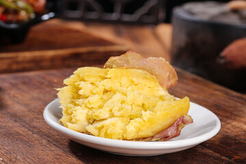 Freshly Dug Sweet Potato Chestnut with Honey Color from Shaanxi China Traditional Food on Wooden Table