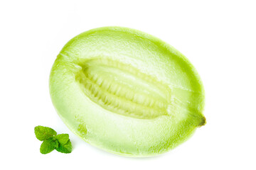 Fresh honeydew melon half with mint leaves on white background - healthy fruit display