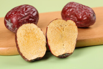 Ruoqiang Red Dates from Xinjiang China - Native Mountain Jujube Fruit Cut in Half Showing Golden Interior