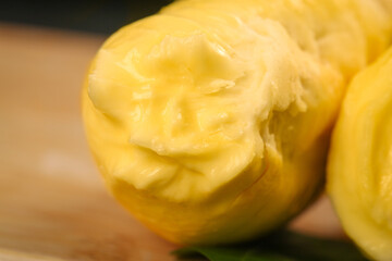 Fresh Golden Durian Fruit with Creamy Flesh Exposed Showing Natural Segments