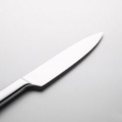 Obraz premium Knife on a white background, close-up, selective focus